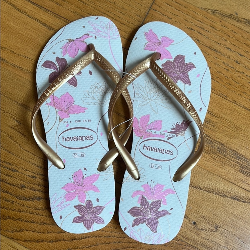 Havaianas White Flip Flops with Gold Straps